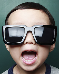 Photo of child in sunglasses