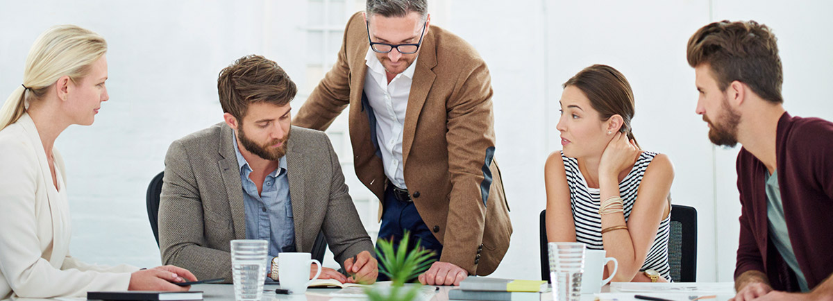 Photo of a team in a business meeting