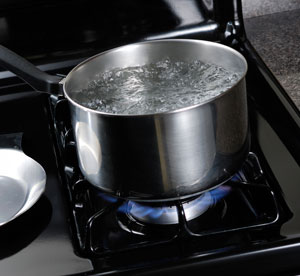 Water boiling on a gas stove
