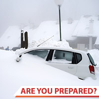 Photo of a car buried in snow